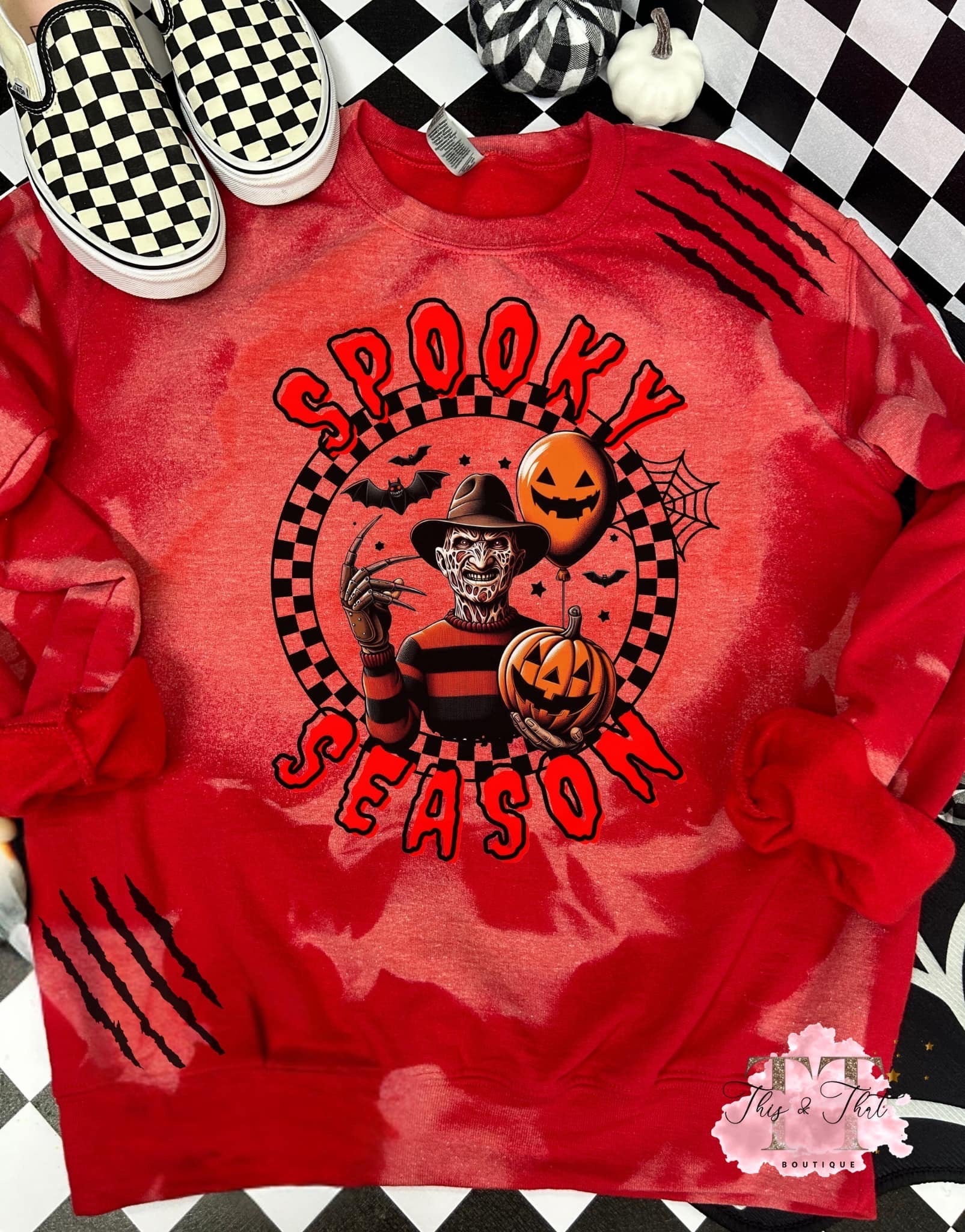 Spooky Season on a Bleached Red Sweatshirt